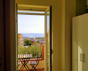 Camera A con balcone vista mare