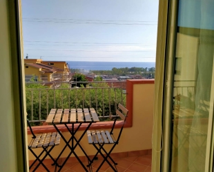 Camera A con balcone vista mare